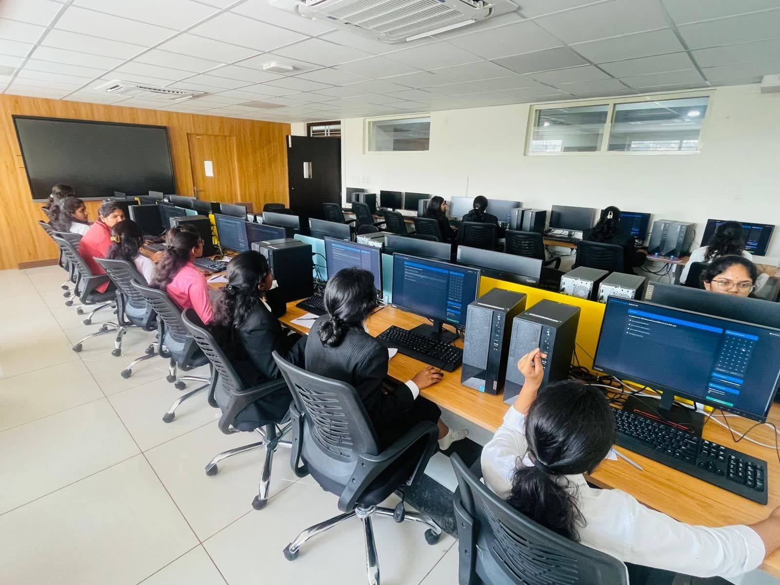 Students taking a Prepzer0 placement test in a computer lab at BGS College of Engineering & Technology