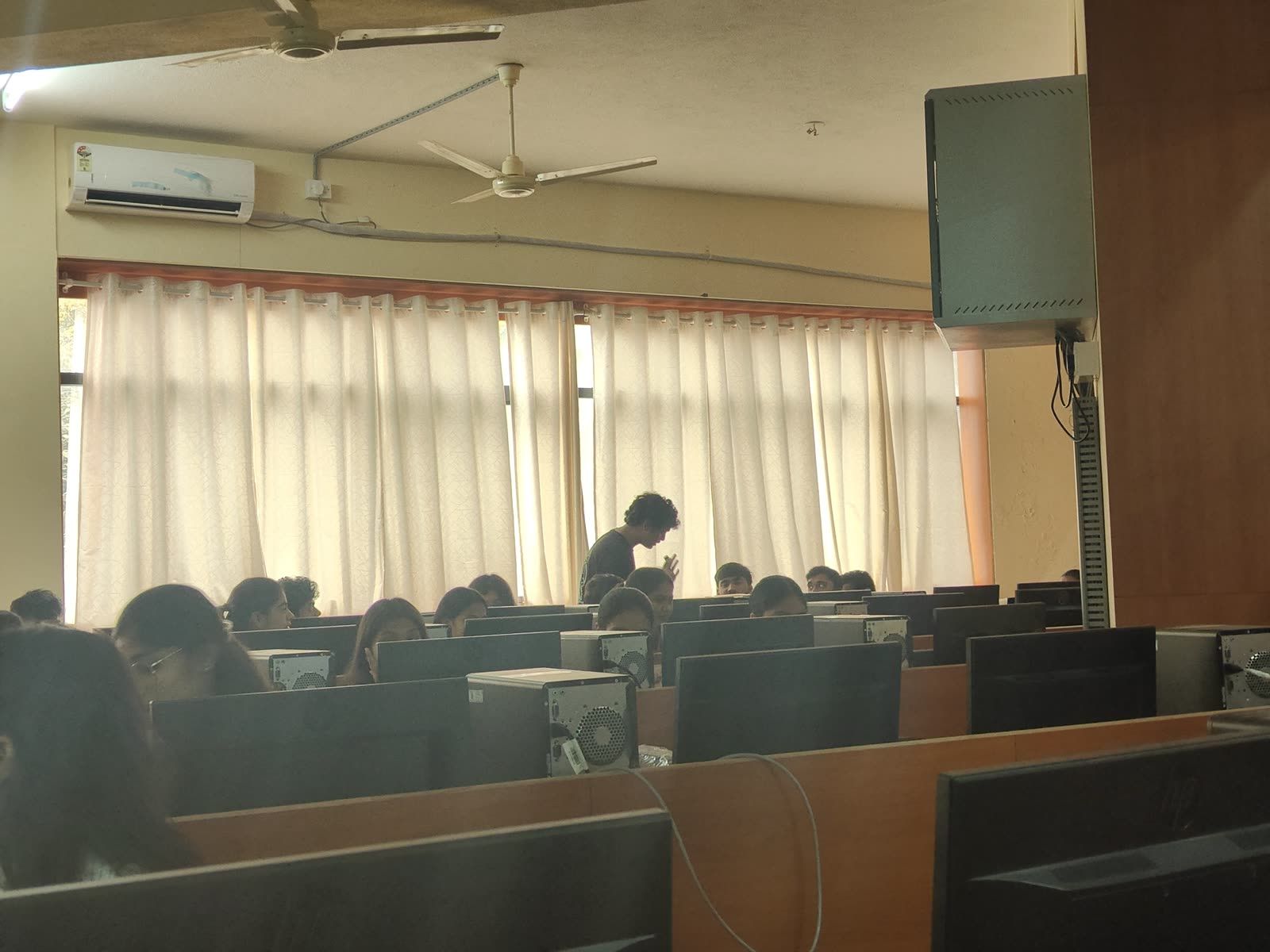 A bright computer lab set up for a hands-on workshop